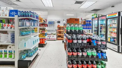 a grocery store aisle with bottles of soda at ⌘Family Beach Home w Amazing Water Views - Upgraded Unit ⌘ in Miami Beach