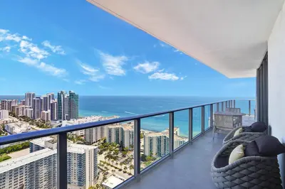 a balcony with a view of the ocean at HYDE 2BR Panoramic Oceanview - No Resort Fees & Free Parking Exclusive to This Unit T3801 in Hollywood