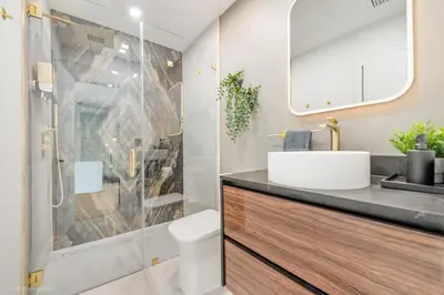 a bathroom with a sink and a shower at Miami Paradise - Htd Pool, Mini Golf, Playground, BBQ, Arcade Machine, baby items in Miami