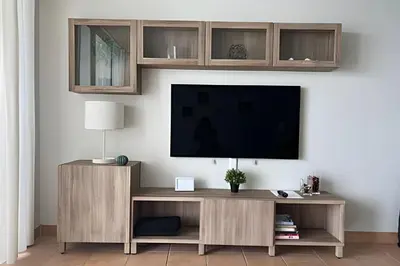 a living room with a flat screen tv on a wall at Pavilion - Best ocean sunrise-Miami Beach in Miami Beach