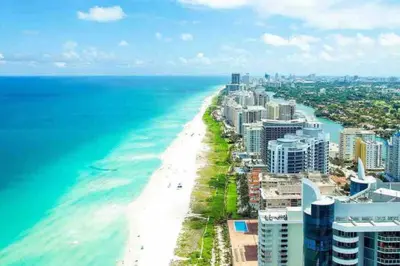 an aerial view of a beach and the ocean at GREAT LOCATION Downtown/Airport/South Beach in Miami