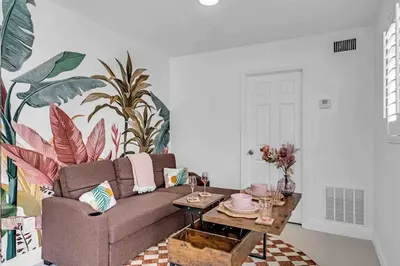 a living room with a couch and a table at Miami Cozy Home! Next to Miami beach & Airport in Miami