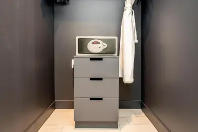 a tv sitting on top of a stack of drawers at High Floor Luxury 2BR 2BA, Sleeps 6, Resort Access - Horizon by HomeStakes Stays in Fort Lauderdale