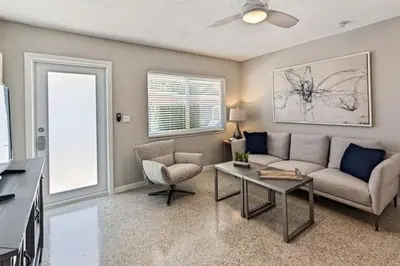 a living room with a couch and a table at Wiltonplex B in Fort Lauderdale