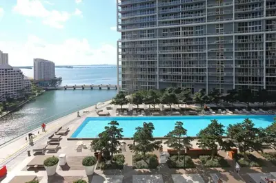 an aerial view of a large swimming pool with a large building at Gorgeous Bay & City view condo in Brickell with Free SPA in Miami