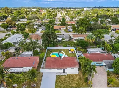 an overhead view of a house with a pool on the roof at Modern Home 3 Bedrooms with Pool, 18 minutes to Ocean in Hollywood