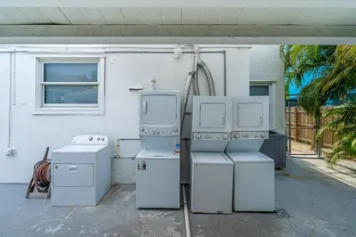 two old appliances sitting outside of a house at Lovely 2 bedroom Studios-Suite Walking Distance To Ocean in Hollywood