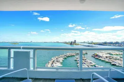 a view of a marina with boats in the water at Feels Like Summer ~ Panoramic Water Views! in Miami