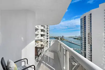 a balcony with a view of the water on a building at The Queen B! Water & Skyline Views - Renovated in Miami