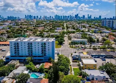 an aerial view of a parking lot with a city skyline at Cozy Little Havana Apt Centrally located Hv2 in Miami