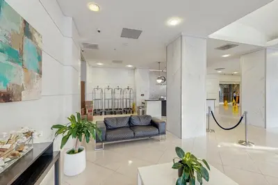 a living room with a couch and a table at Ocean Reserve 1607 in Miami Beach