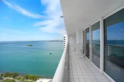 a balcony with a view of the water at Wildest Dreams Penthouse! Dreams Do Come True in Miami