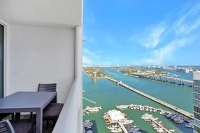 a balcony with a view of a marina at Champagne & Ice! Water Views, 2 Private Balconies! in Miami