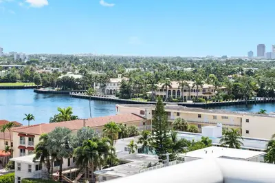 an aerial view of a city with a river and buildings at Oceanview Luxury, Resort Access, Sleeps 6 2BR 2BA - Vista Mar by HomeStakes Stays in Fort Lauderdale