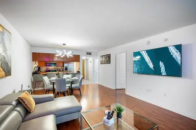 a living room with a couch and a table at Modern Bayview Apartment in Brickell Bay in Miami