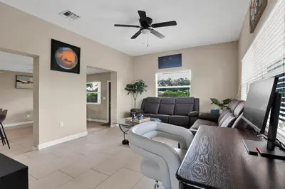 a living room with a couch and a table at Home away from home in Hollywood