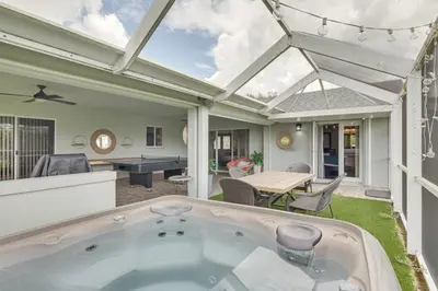 a jacuzzi in the backyard of a house at Pet-Friendly Miami Home with Hot Tub and Pool Table in Miami