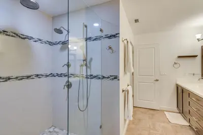 a bathroom with a glass shower and a sink at Pet-Friendly Miami Home with Hot Tub and Pool Table in Miami
