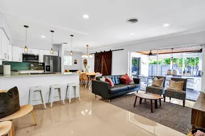 a large living room with a kitchen and a living room at Outdoor Paradise in Fort Lauderdale