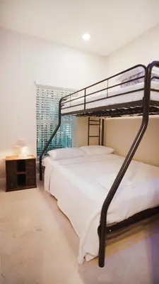 two bunk beds in a room with a window at Spectacular Apartment near Brickell in Miami