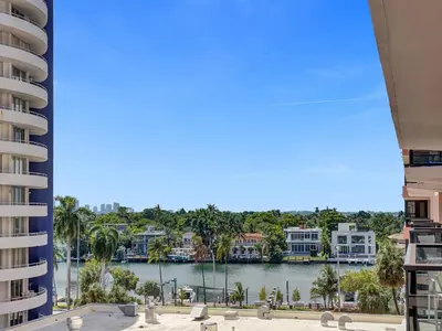 a view of a river between two buildings at Cozy 2 Bedroom Ocean View Beach Service 707 in Miami Beach