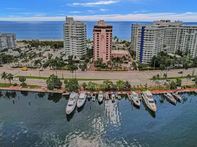 a group of boats docked in the water in a city at Beach Resort condo 921 in Miami Beach