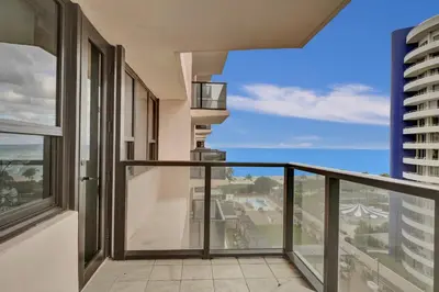 a balcony with a view of the ocean at Cozy Ocean View Condo Beach Service 1015 in Miami Beach