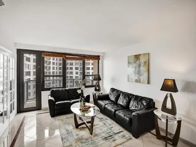 a living room with a couch and a table at Perfect Ocean View Condo Beach Service 1109 in Miami Beach