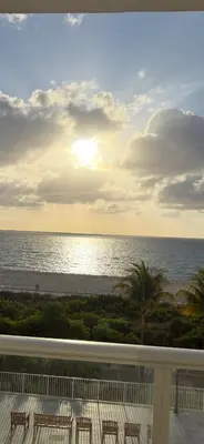 a view of the ocean from the balcony of a resort at Pavilion in Miami Beach