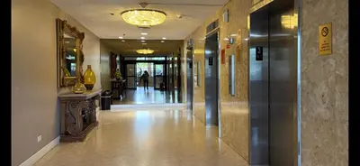 a hallway of a building with a hallwayngth at Pavilion in Miami Beach