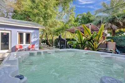 a swimming pool in the backyard of a house at Kiki 2 - Men's Clothing optional Guest Houses in Fort Lauderdale