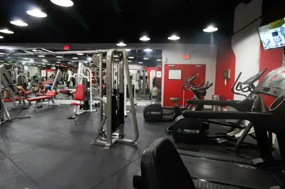 a gym with several treadmills and machines at Castle 515 Studio BayView Direct Beach Access, Pool, Tennis, Free Parking in Miami Beach