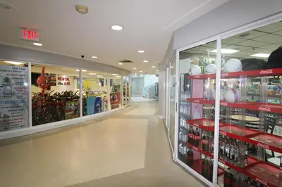 a store aisle with a lot of products at Castle BTH2 Stunning Oceanfront Townhouse, Private Beach Access, Private Pool Access, Tennis and Free Parking! in Miami Beach