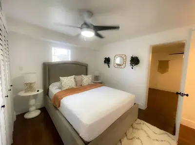 a bedroom with a bed and a ceiling fan at New Miami Boutique, by Calle Ocho and South Beach! in Miami