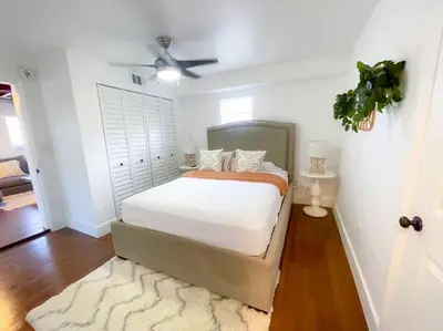 a bedroom with a bed and a ceiling fan at New Miami Boutique, by Calle Ocho and South Beach! in Miami