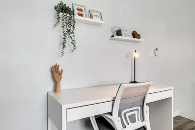 an office with a white desk and a chair at Mia Airport 1b Apt with desk Virg 9 in Miami