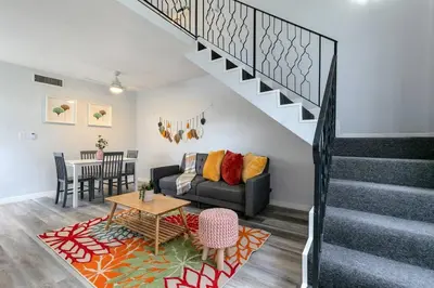 a living room with a couch and a table at Central 1b apt Next to Airport Virg 12 in Miami