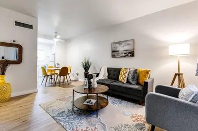 a living room with a couch and a table at Spacious 2 BR near Miami Airport Virg 5 in Miami