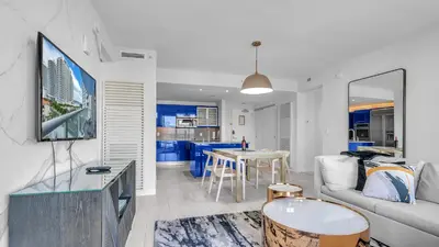 a living room with a couch and a table at Your Private Oceanfront Sanctuary 2BR 2BA in Fort Lauderdale