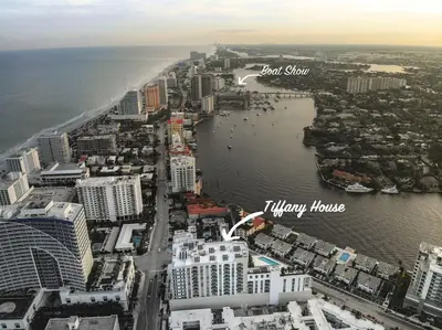an aerial view of a city with a body of water at Tiffany Indigo - Rooftop Pool, Gym, Walk to Beach in Fort Lauderdale