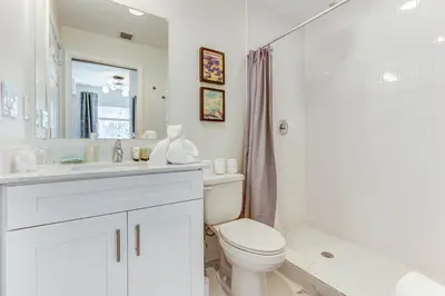 a bathroom with a toilet and a sink and a shower at ArTease4 - stylish, near Wynwood Walls & restaurants in Miami