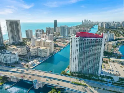 an aerial view of a city with buildings and a bridge at Upper studio with Balcony - Pool - Gym in Hallandale Beach