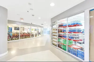 an empty aisle of a store with bikes on shelves at Castle 1029 Balcony studio with Ocean View, Pool, Tennis and Free Parking in Miami Beach