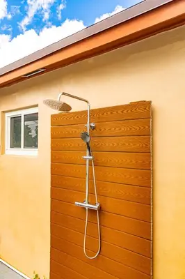 a shower on the side of a house at Escape to Private Poolside Bliss in Hollywood