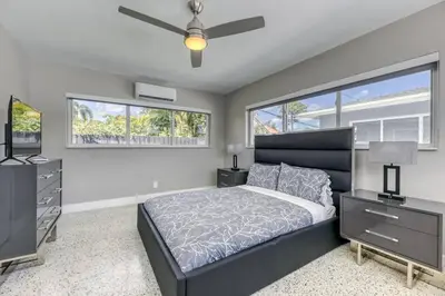 a bedroom with a bed and a ceiling fan at Sunshine Manors 2017-3 in Fort Lauderdale