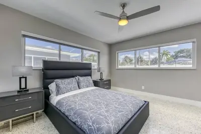 a bedroom with a bed and a ceiling fan at Sunshine Manors 2017-3 in Fort Lauderdale