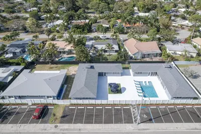 an aerial view of a house with a swimming pool at Sunshine Complex in Fort Lauderdale