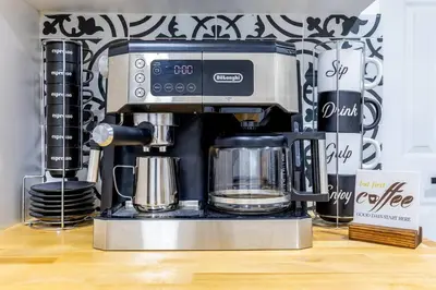 a coffee maker sitting on top of a counter at Serenity Lodge II Condo in Miami