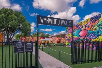 a wynwood walls sign in front of a park at Serenity Lodge II Condo in Miami