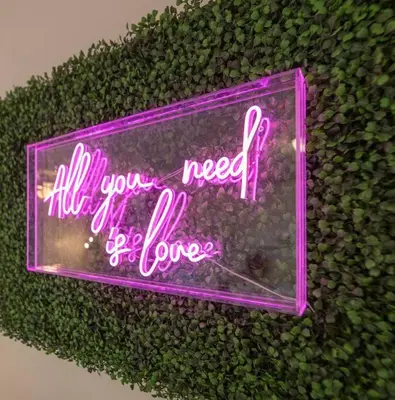 a neon sign that says all you need of love at Boho 6, studio Near Air-Cruise Port & Beach in Fort Lauderdale